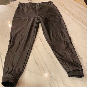 Spanx Faux leather joggers in black.